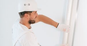 Plasterboard being installed during a renovation