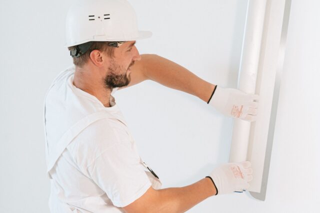 Plasterboard being installed during a renovation