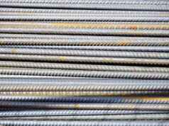 Common Types of Reinforcement Used in Modern Construction Close-up of stacked steel reinforcing bars ready for use on a construction site
