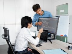 Due Diligence on a Public-Record API: The Groundwork That Comes First Engineers reviewing code on a monitor: Due Diligence on a Public-Record API: The Groundwork That Comes First