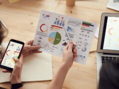 Why Your Next SEO Agency Should Already Speak Your Industry’s Language Why Your Next SEO Agency Should Already Speak Your Industry's Language: marketing specialists reviewing SEO and campaign analytics charts at a desk